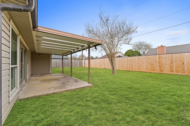 view of yard featuring a patio area and a fenced backyard