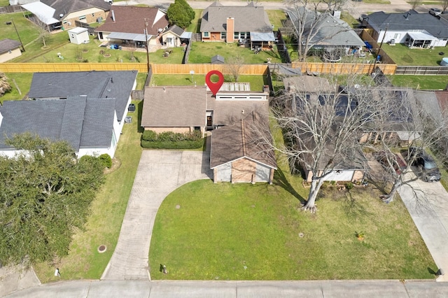 birds eye view of property with a residential view