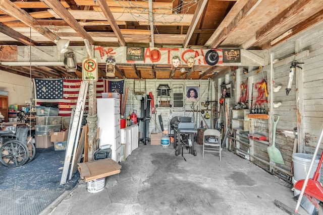 garage with a workshop area