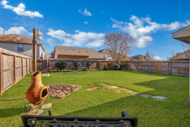 view of yard featuring a fenced backyard