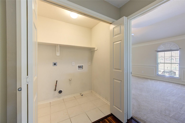 laundry area featuring crown molding, hookup for a washing machine, hookup for a gas dryer, electric dryer hookup, and laundry area