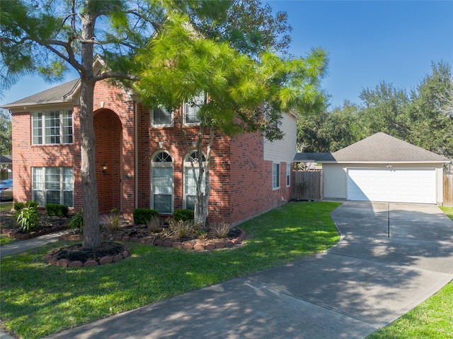 view of front of house featuring a front yard, brick siding, driveway, and fence