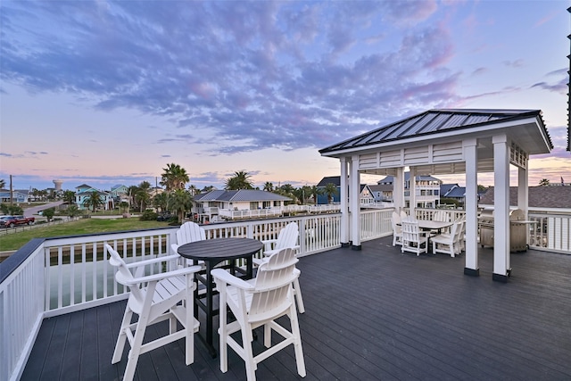 view of deck at dusk