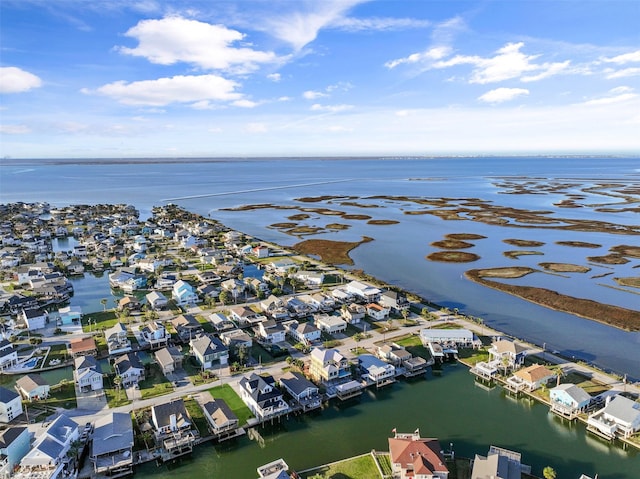 aerial view with a residential view and a water view