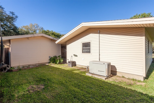 view of home's exterior with a yard