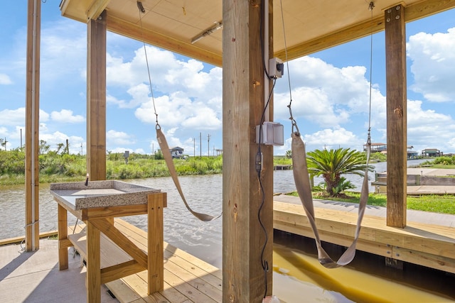 view of dock with a water view