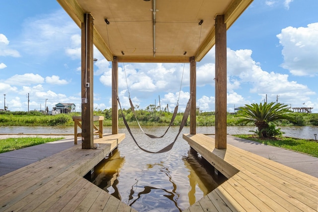 view of dock with a water view