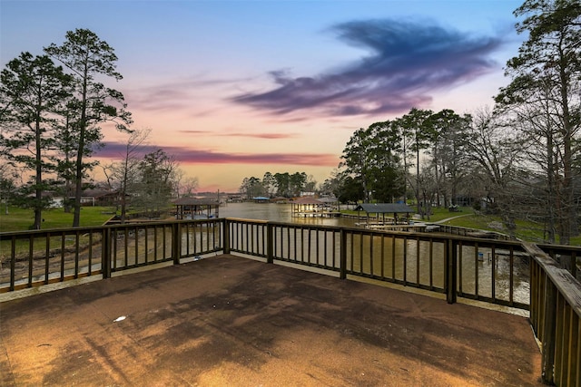 wooden terrace with a water view