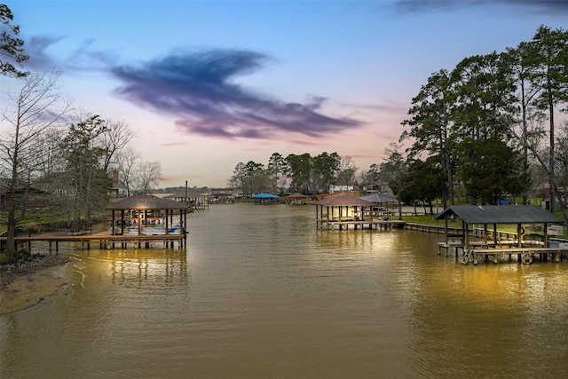 dock area featuring a water view and boat lift