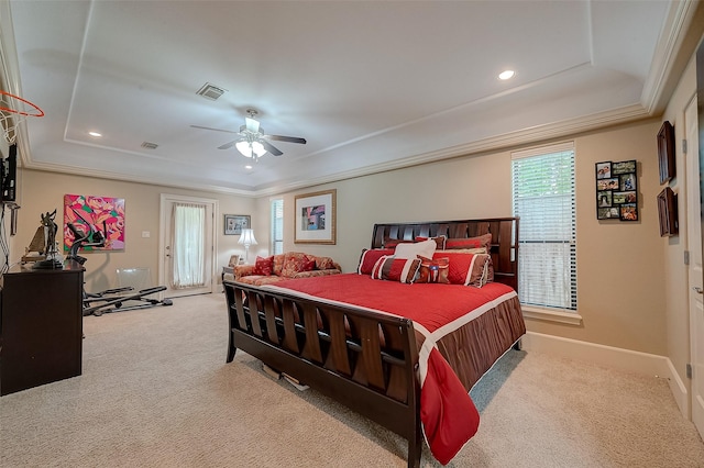 carpeted bedroom with recessed lighting, a raised ceiling, visible vents, ornamental molding, and baseboards