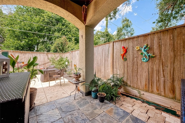 view of patio / terrace featuring a fenced backyard