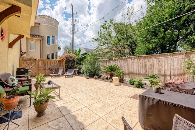 view of patio / terrace with fence