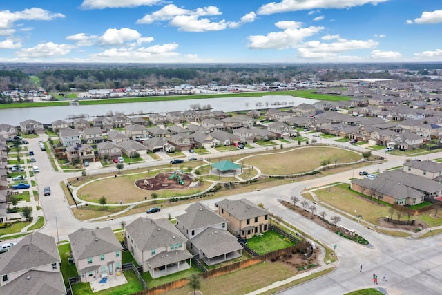 aerial view with a water view and a residential view