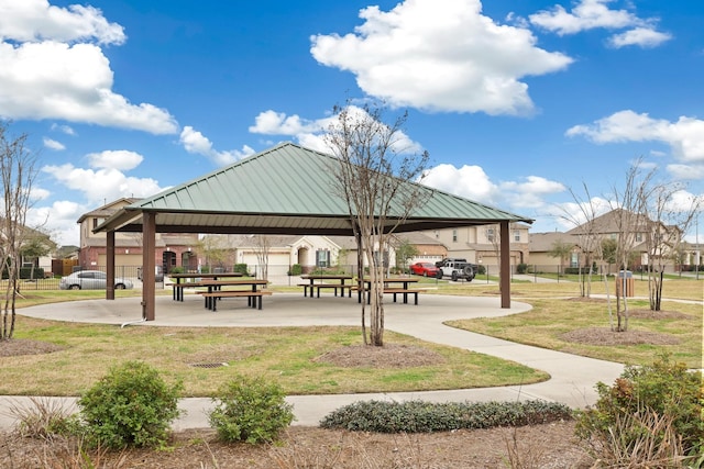 view of community featuring a lawn and a gazebo