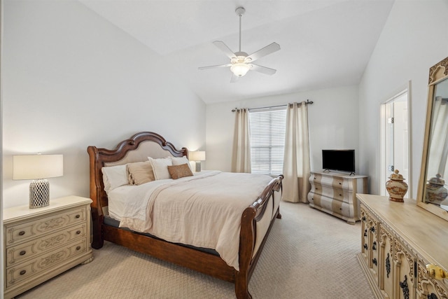 bedroom featuring lofted ceiling, light carpet, and a ceiling fan