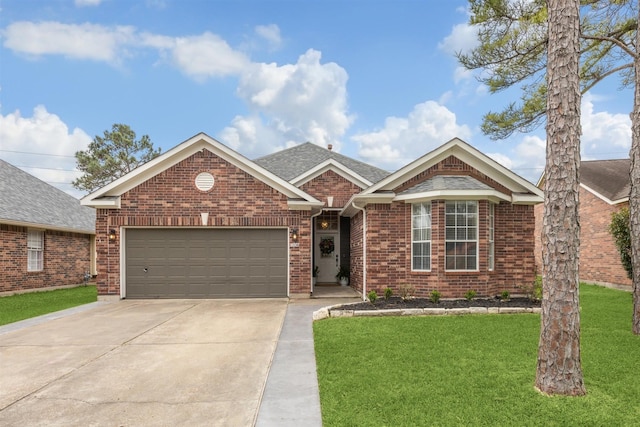 single story home featuring brick siding, concrete driveway, a front yard, roof with shingles, and an attached garage