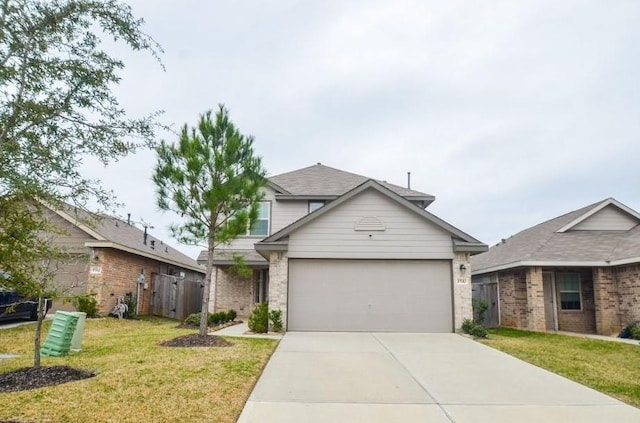 traditional home with brick siding, fence, a garage, driveway, and a front lawn