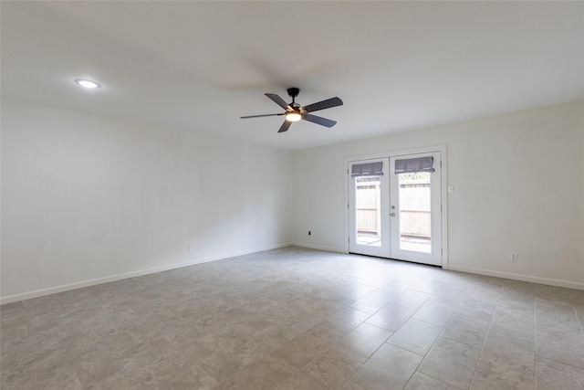 unfurnished room featuring french doors, ceiling fan, and baseboards