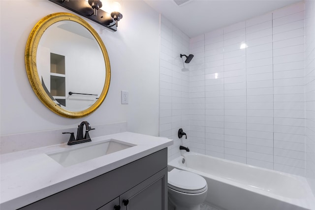 bathroom featuring toilet, shower / tub combination, and vanity