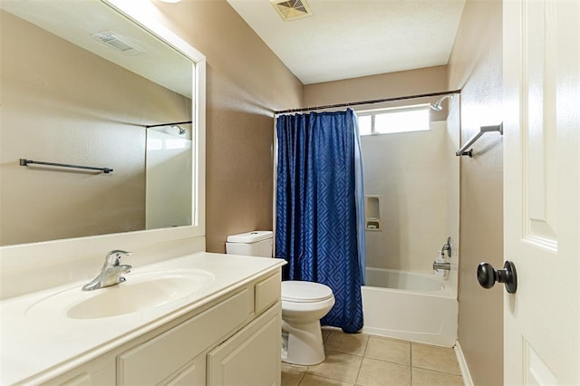 bathroom featuring toilet, shower / bath combination with curtain, visible vents, and tile patterned floors