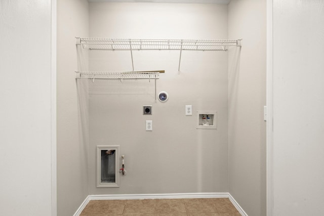 laundry area with hookup for a gas dryer, hookup for a washing machine, laundry area, and hookup for an electric dryer