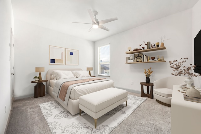 bedroom with ceiling fan, baseboards, and light colored carpet