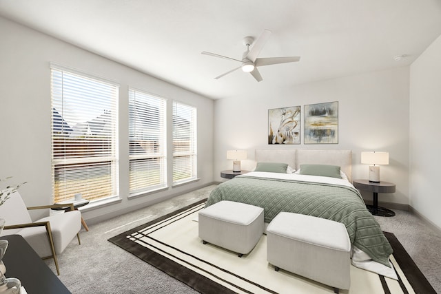 bedroom featuring carpet floors, ceiling fan, and baseboards