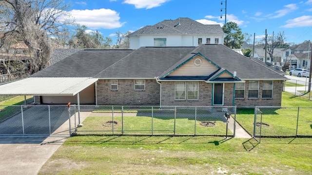 view of front of house featuring an attached carport, a fenced front yard, brick siding, concrete driveway, and a front yard