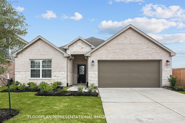 view of front facade featuring an attached garage, stone siding, driveway, and a front yard