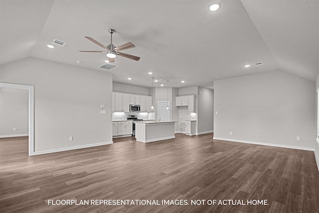 unfurnished living room with lofted ceiling, recessed lighting, ceiling fan, wood finished floors, and baseboards