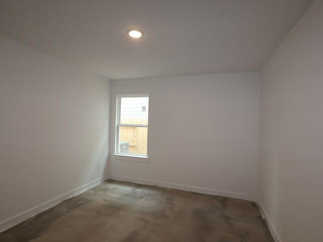 empty room with baseboards