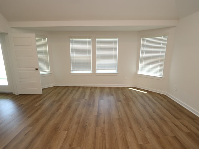 22450 Birchfield Grove Ln, New Caney, TX 77357 - spare room featuring wood finished floors and baseboards