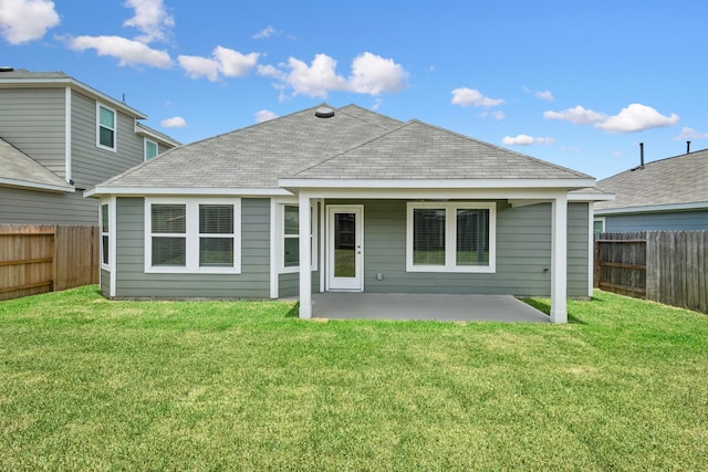22450 Birchfield Grove Ln, New Caney, TX 77357 - back of property with a patio area, a fenced backyard, and a shingled roof