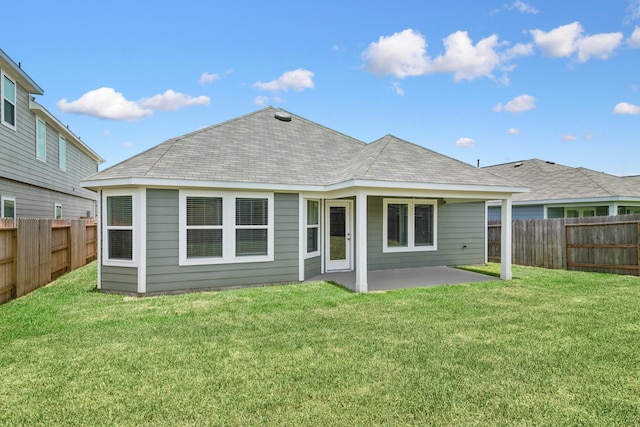 22450 Birchfield Grove Ln, New Caney, TX 77357 - back of property featuring a patio area, a fenced backyard, and roof with shingles