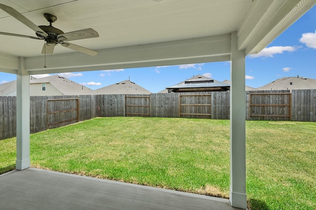 22450 Birchfield Grove Ln, New Caney, TX 77357 - fenced backyard featuring ceiling fan