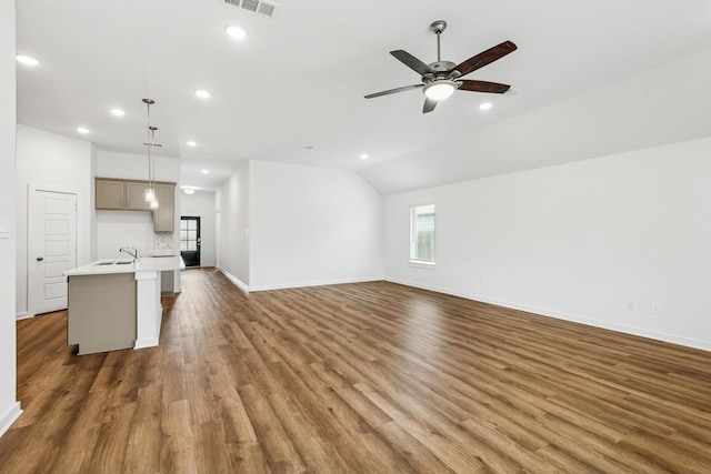22450 Birchfield Grove Ln, New Caney, TX 77357 - unfurnished living room featuring recessed lighting, wood finished floors, lofted ceiling, and ceiling fan
