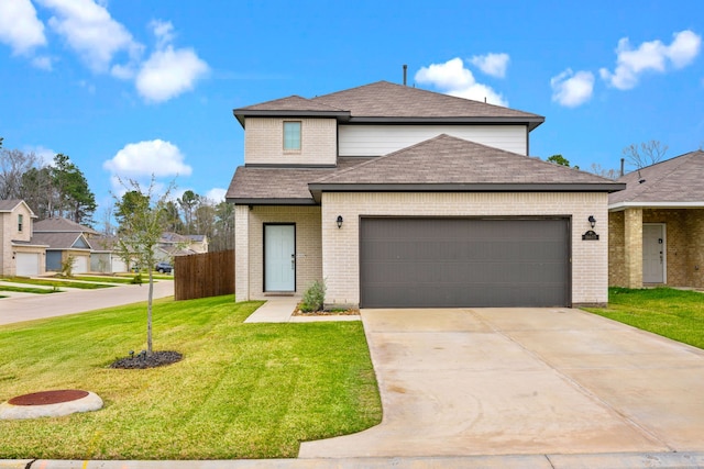 traditional home featuring brick siding, roof with shingles, an attached garage, a front yard, and driveway