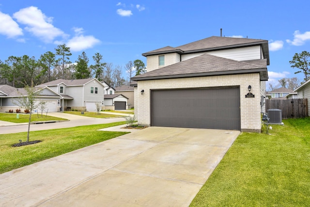 view of front facade featuring cooling unit, brick siding, driveway, and a front yard