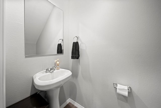 bathroom featuring baseboards