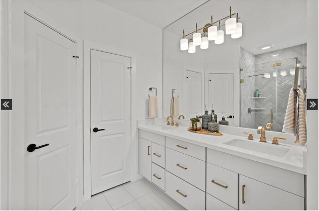 bathroom with tile patterned flooring, a sink, a shower stall, and double vanity