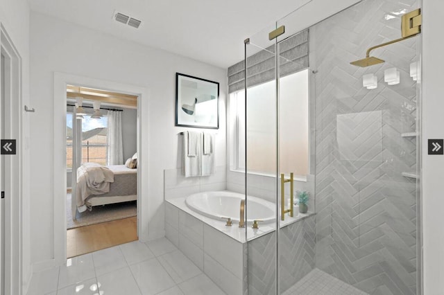 bathroom featuring a stall shower, visible vents, a garden tub, and ensuite bathroom