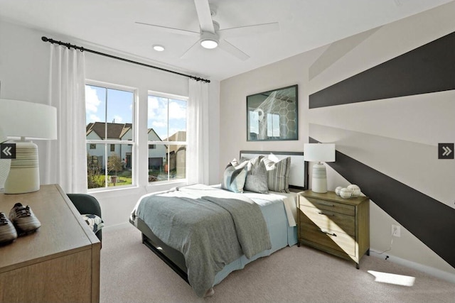 bedroom with recessed lighting, a ceiling fan, light carpet, and baseboards