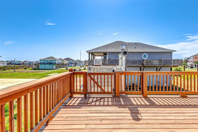 wooden deck with a residential view