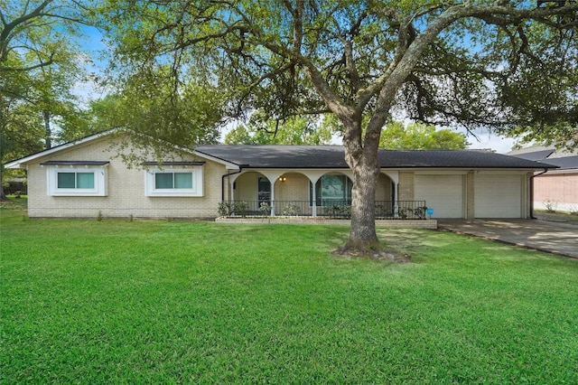 ranch-style home featuring concrete driveway, an attached garage, a front lawn, a porch, and brick siding