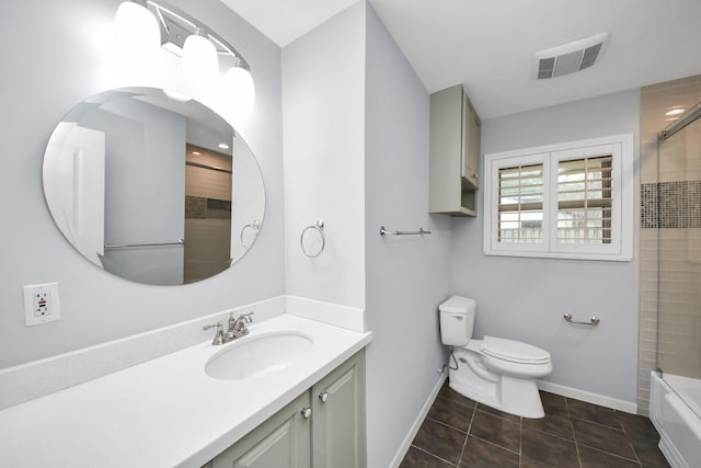 bathroom with visible vents, toilet, vanity, baseboards, and tile patterned floors