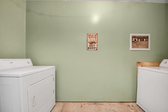 laundry area with independent washer and dryer