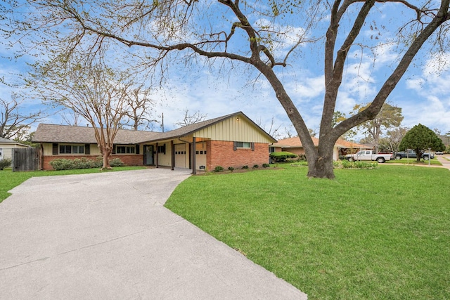 single story home with an attached garage, brick siding, fence, driveway, and a front yard