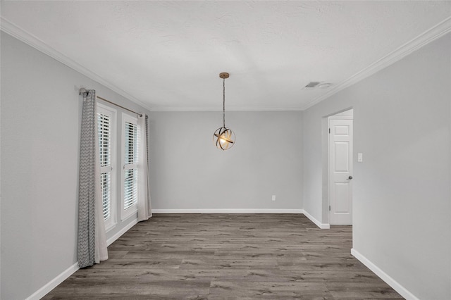 3048 Gessner Rd, Houston, TX 77080 - empty room with ornamental molding, wood finished floors, and baseboards