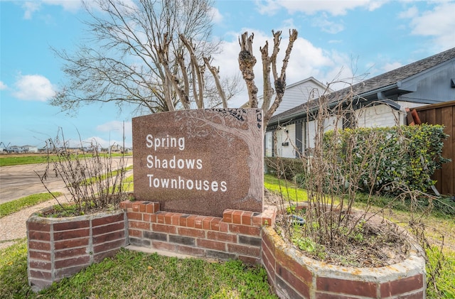 view of community sign