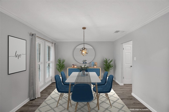 dining area with dark wood-style floors, ornamental molding, and baseboards